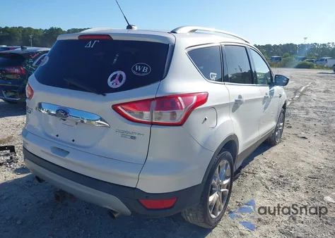 2015 Ford Escape Titanium z USA, uszkodzony, nr VIN 1FMCU9J98FUB79114